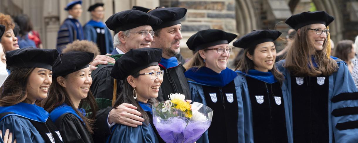 Group of PhD graduates outside Duke Chapel