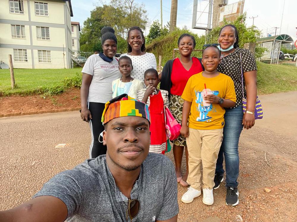 Photo: With family in Kampala
