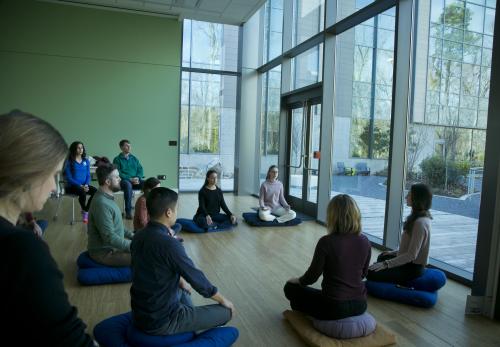 Students meditate at the wellness center