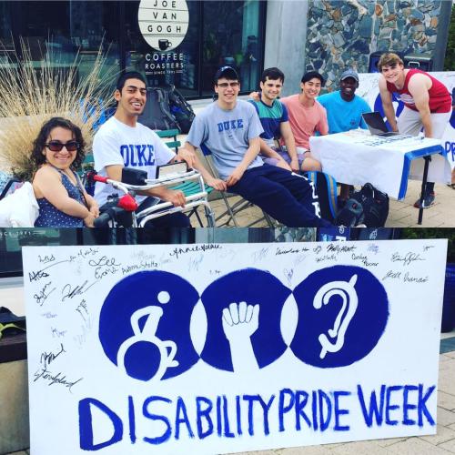 The top photo in this collage includes seven members of DDA tabling for the 2018 Disability Pride Week. The bottom photo shows the table banner, which includes several signatures, the words "Disability Pride Week," and iconography for disability pride.