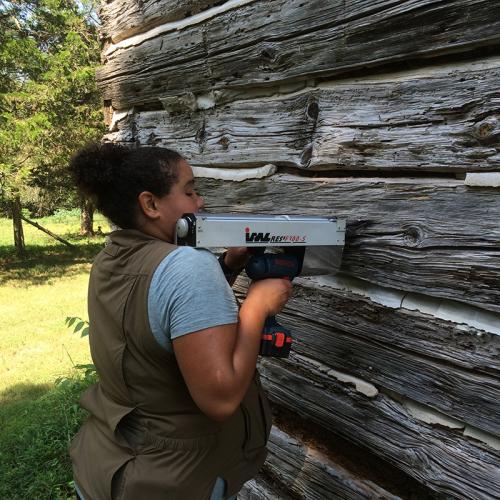 Jobie Hill uses a resistance drill on a slave house