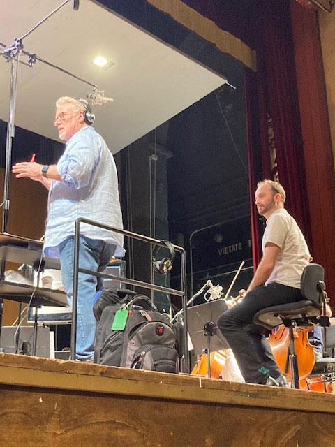 Chris Williams (right) with Pete Anthony conducting his composition with the ORT orchestra in Florence