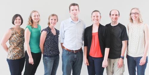 L-R: Lauren Lilley Lohmer, Erin Soule, Melissa Keenan, Jared Barrott, Allie McClure, Richard Mortensen, Marcela Kokes. Not pictured: Matt Crowe, Sarah Lawson Gemberling.