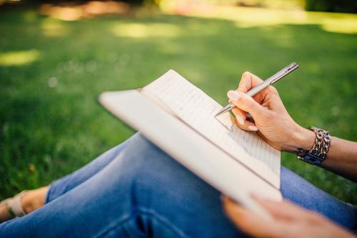 Image of person writing